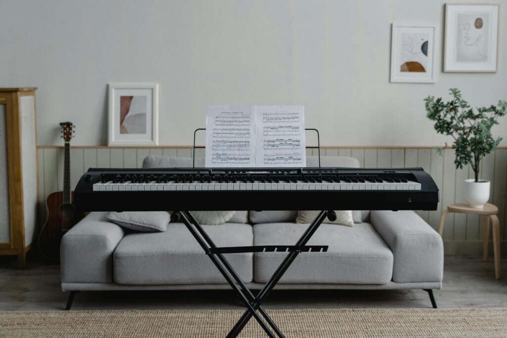 A stylish living room featuring a piano and modern decor, perfect for music enthusiasts.